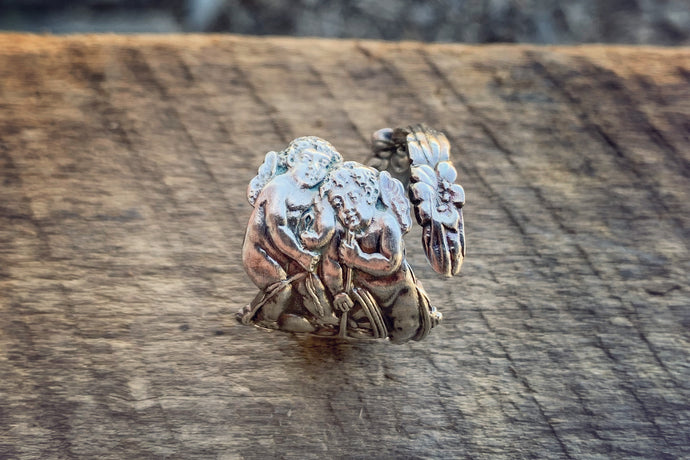 A Cupids Trio Sterling Spoon Ring